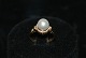 Antik Huset 
presents: 
18 Carat 
Gold ring with 
Pearl and 
Diamonds 
Size: 52