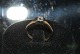 Antik Huset 
præsenterer: 
14 karat 
Guldring med 
Brillant 
Ring størrelse 
52
