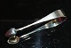 Sugar tongs / Candied Tang Empire Silver
Length 11 cm.