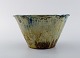 Arne Bang for Holmegaard, Denmark. Unique Bowl in glazed ceramics. Beautiful 
running glaze in shades of blue and green. 1930