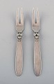 Two Georg Jensen Cactus cold meat forks in sterling silver.
