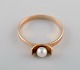 Viggo Wollny, Copenhagen (1921-73). Vintage art deco ring in 14 carat gold 
adorned with cultured pearl. 1930s / 40s.
