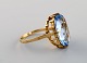 Vintage art deco ring in 8 carat gold adorned with large light blue 
semi-precious stones. 1940