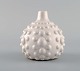 European studio ceramist. Unique vase in white glazed ceramics. 1980