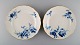 Two Meissen plates in hand-painted porcelain with flowers and gold rim. 20th 
century.
