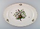 Royal Copenhagen "Spring" porcelain dish with motifs of birds and foliage. 
1980s. Model number: 1533/2509.
