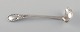 Evald Nielsen number 13 butter sauce spoon in hammered silver (830). Dated 1924.
