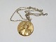 Royal Copenhagen
Gold pendant  with silver necklace