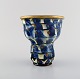 Kähler, Denmark. Vase in glazed stoneware with brass mounting. Blue flowers on a 
cream colored background. 1930 / 40s.
