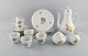 Bjørn Wiinblad for Rosenthal. Complete Romanze coffee service for six people in 
white porcelain with gold decoration. 1980s.
