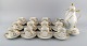 Rosenthal, Germany. Porcelain coffee service with gold decoration for 12 people 
with coffee pot and sugar bowl. 20th century.
