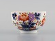 Rare antique tea cup in hand-painted porcelain decorated with flowers. 18/19th 
century.
