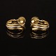 A pair of 18kt gold Georg Jensen earclips. #1488. Size: 20x18mm