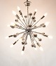 Ceiling Sputnik pendant in chrome designed by Poul De Han from The Netherlands.
5000m2 showroom.
