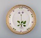 Royal Copenhagen Flora Danica salad plate in hand-painted porcelain with flowers 
and gold decoration. Model number 20/3573.
