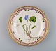 Royal Copenhagen Flora Danica salad plate in hand-painted porcelain with flowers 
and gold decoration. Model number 20/3573.
