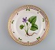 Royal Copenhagen Flora Danica salad plate in hand-painted porcelain with flowers 
and gold decoration. Model number 20/3573.
