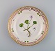 Royal Copenhagen Flora Danica salad plate in hand-painted porcelain with flowers 
and gold decoration. Model number 20/3573.
