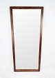 Mirror with slim frame in rosewood of danish design from the 1960s.
5000m2 showroom.
