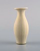 Gunnar Nylund for Rörstrand. Rare miniature vase in glazed ceramics. Beautiful 
eggshell glaze. 1950s.
