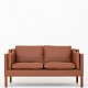 Børge Mogensen / Fredericia Furniture
BM 2212 - Reupholstered 2-seater sofa in Savanne Cognac leather. KLASSIK offers 
upholstery of the sofa in fabric or leather of your choice.
Availability: 6-8 weeks
Renovated
