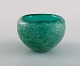 Murano bowl in turquoise mouth blown art glass with inlaid bubbles. Italian 
design, 1960s.
