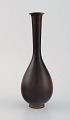Berndt Friberg for Gustavsberg. Modernist vase in glazed ceramics. Beautiful 
glaze in brown shades. Dated 1955.
