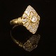 An 18kt gold Art Deco ring with diamonds. Largest diamond ca. 0,25ct. Ringsize 
58