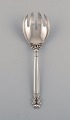 Georg Jensen Acorn salad serving fork in sterling silver.
