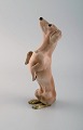 Bing & Grøndahl porcelænsfigur. Tiggende gravhund. Modelnummer 1603. 1920