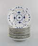 11 Royal Copenhagen Blue fluted Plain deep plates. Model number 1/165. Dated 
1949.
