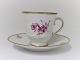 Bing & Grondahl. Hamlet. With purple colored flower and gold border. Coffee cup. 
There are 10 pieces in stock. The price is per piece.