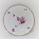 Bing & Grondahl. Hamlet. With purple colored flower and gold border. Cake plate. 
Diameter 17.5 cm. There are 11 pieces in stock. The price is per piece.