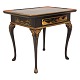 A black laquered Rococo slate top table. Denmark circa 1760. Slate top later. H: 
75cm. Top: 87x61cm