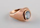 Scandinavian jeweler. Vintage ring in 14 carat gold adorned with light blue 
semi-precious stone. Mid-20th century.
