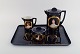 Antique coffee service in hand-painted porcelain with motifs of young women in 
profile and gold decoration. Vienna, late 19th century.
