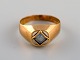 Swedish jeweler. Modernist vintage ring in 18 carat gold adorned with 
semi-precious stone. Dated 1967.
