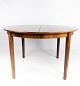 Dining table in rosewood with three extension plates, of danish design from the 
1960s. 
5000m2 showroom.