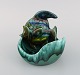 Belgian studio ceramicist. Bowl in glazed ceramics modeled with fish. Beautiful 
glaze in shades of blue-green. 1960s / 70s.
