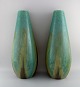 A pair of colossal French art deco floor vases in glazed ceramics. Beautiful 
glaze in turquoise and light earth shades. 1940s.
