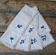 Set of 7 cloth napkins embroidered with blue flower