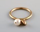 Scandinavian jeweler. Vintage ring in 8 carat gold adorned with cultured pearl. 
Mid-20th century.
