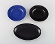 Royal Copenhagen / Aluminia Confetti dish and two plates in black and blue 
glazed faience. Mid-20th century.
