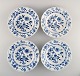 Four antique Meissen Blue Onion deep plates in hand-painted porcelain. Early 
20th century.
