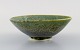 Eli Keller (b. 1942), Sweden. Unique bowl in glazed stoneware. Beautiful crystal 
glaze in shades of green. 21st Century.
