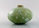 Eli Keller (b. 1942), Sweden. Round unique vase in glazed stoneware. Beautiful 
crystal glaze in light green shades. 21st Century.
