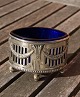 Oval silver plated salt cellar on 4 legs with deep 

blue glass insert by WMF