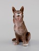 Antique Bing & Grøndahl porcelain figurine. Sitting German Shepherd. Model 
number 2197. Early 20th century.
