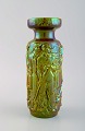 Art deco Zsolnay vase in glazed ceramics modeled with workers. Beautiful luster 
glaze. 1920s / 30s.
