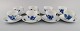 Eight Royal Copenhagen Blue Flower Braided coffee cups with saucers. Mid 20th 
century. Model number 10/8261.
